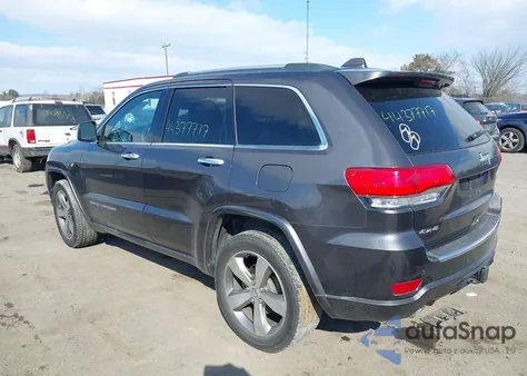 2014 Jeep Grand Cherokee Overland z USA, uszkodzony, nr VIN 1C4RJFCG6EC474380